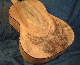 The Santos with a highly figured Myrtle back called "the Eagle".  Sorry this is the only set of wood I have ever seen with this type of figure.  Normally I use Spanish Cypress for the Santos.