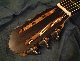 The traditional peghead as found on many Spanish guitars in the early part of the 20th century.  This is an authentic 1918 Santos version with All Black Gilbert tuners and polished Ebony plate.
